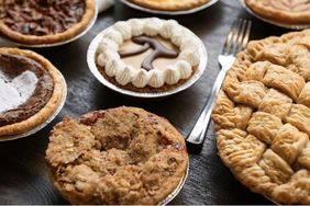 An assortment of pies arranged on a table