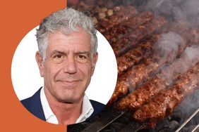 Anthony Bourdain next to grilled kebabs