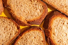 Slices of toasted bread placed on a surface
