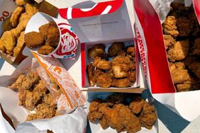 Assorted chicken nuggets from various fastfood chains displayed in packaging