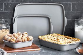 Bakeware set displayed with pastries and a pie