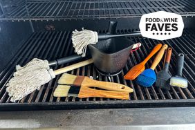 Various basting brushes laid out on grill