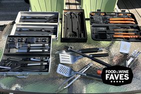 seven sets of grill tools on a table