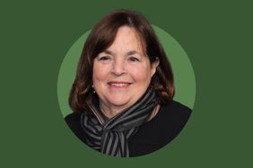Ina Garten smiling wearing a scarf against a green background