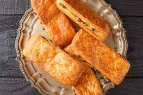 A plate of pastries specifically pain au chocolat arranged on a decorative plate