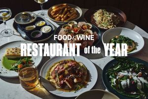 A table display of various dishes with the text Food Wine Restaurant of the Year overlaid