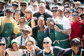 Chefs posing for a group photo at the Southern Smoke Foundation Festival.