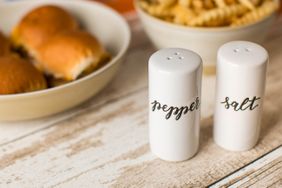 Salt and pepper shaker bottles at a burger restaurant