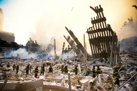 The rubble of the World Trade Center smoulders following a terrorist attack September 11, 2001 in New York. A hijacked plane crashed into and destroyed the landmark structure.