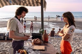 (L-R) Dominic Sessa, Emilia Jones in 'Tony,' the Anthony Bourdain biopic.